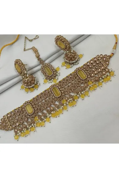 Yellow Alloy Metal Stone-Studded Necklace & Earrings with Mang Tikka Set