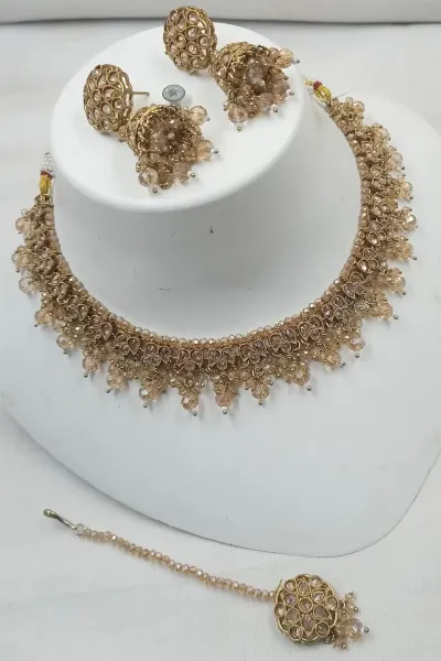 Gold Copper Stone-Studded Necklace & Earrings with Mang Tikka Set